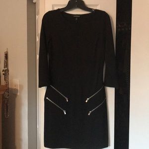 Black dress with zipper embellishments